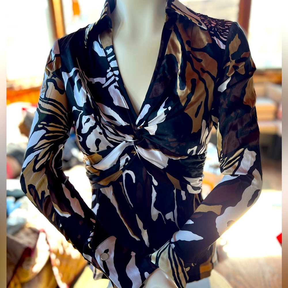 A bit of a throwback silk XS multicolored long sleeved blouse